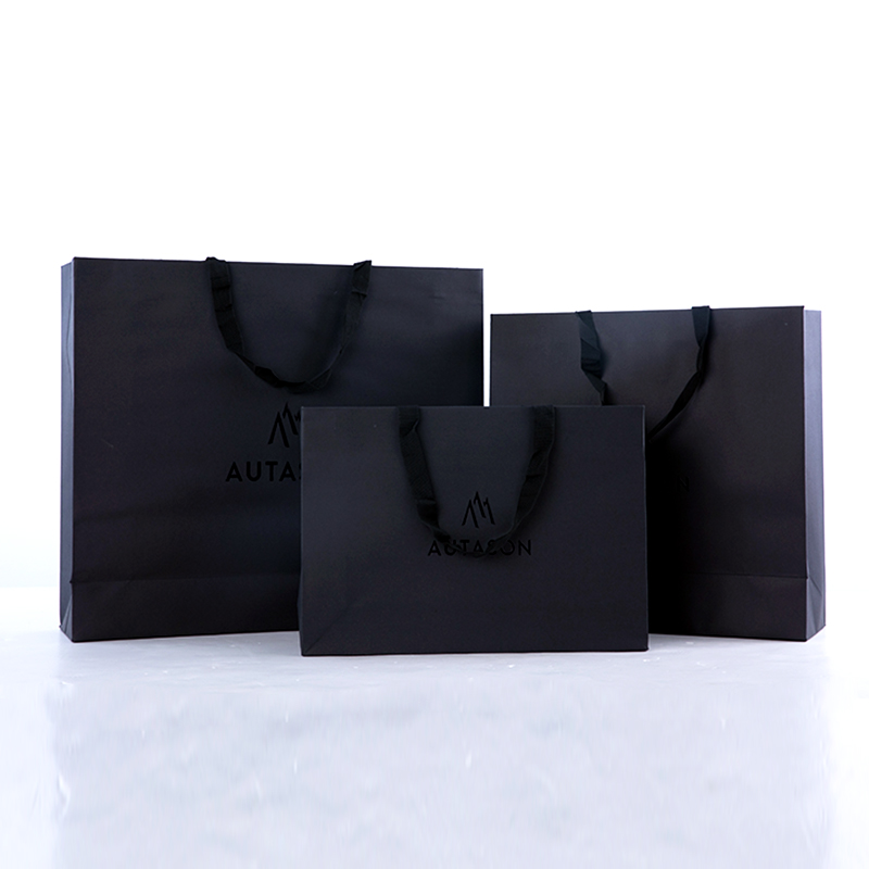 Custom retail bags Luxury Boutique Clothing Packaging Die cut Handle Premium Shopping special Paper Gift Bag