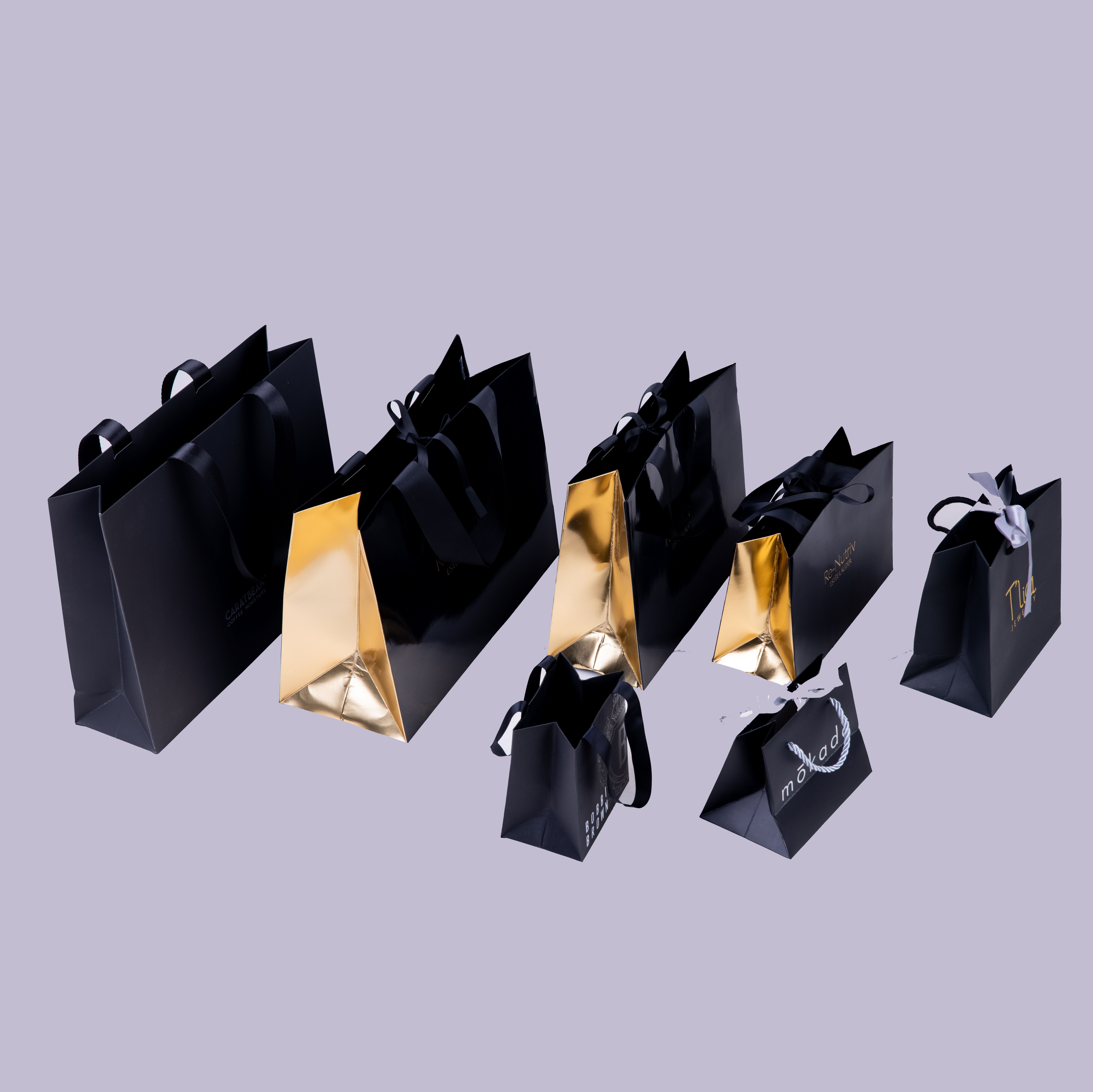 Wholesale Small Luxury Custom LOGO UV Coated Paper Gift Bags For Jewelry Watch Perfume Small Business Packaging paper bag